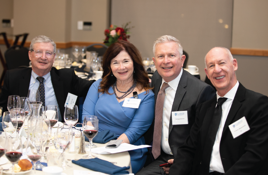 Four guests at the preview dinner