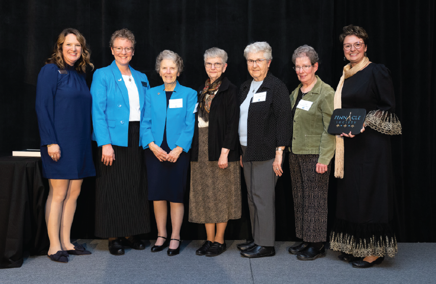 presentation sisters receiving an award at SAU