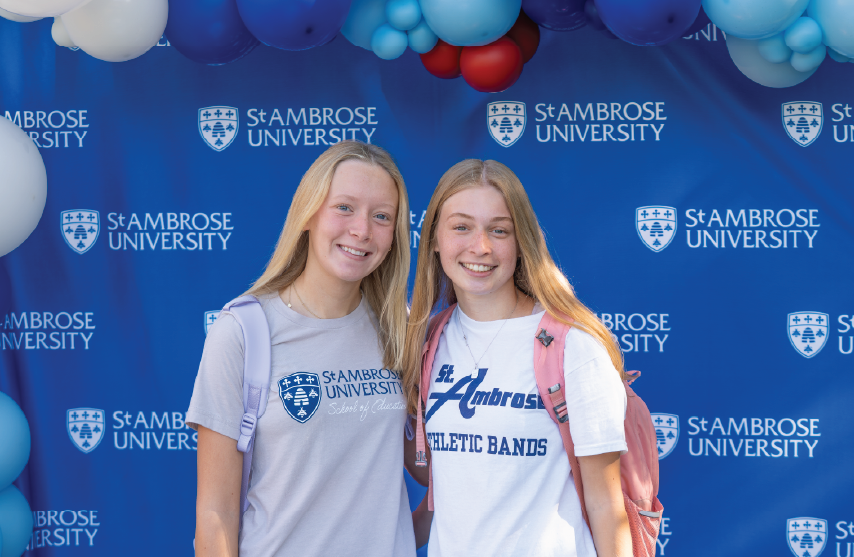 two SAU female students in SAU gear