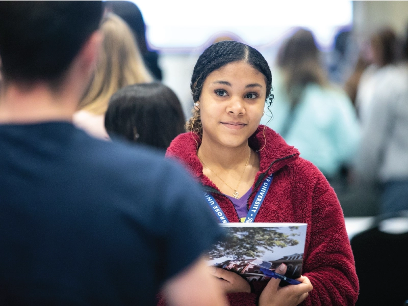 Student looking at someone smiling