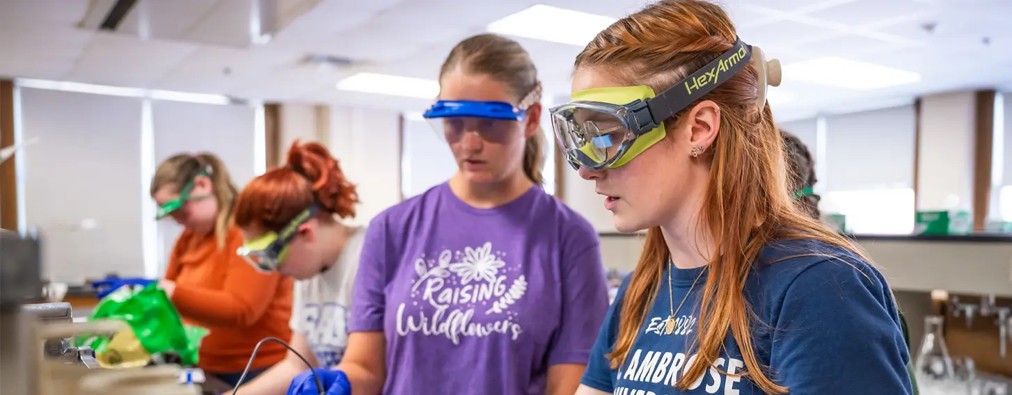 Students conducting experiments in a chemistry lab.