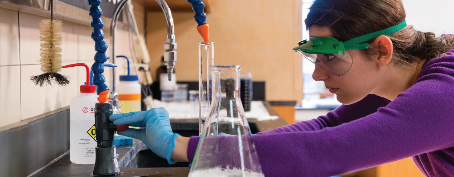 Student in biochemistry lab.