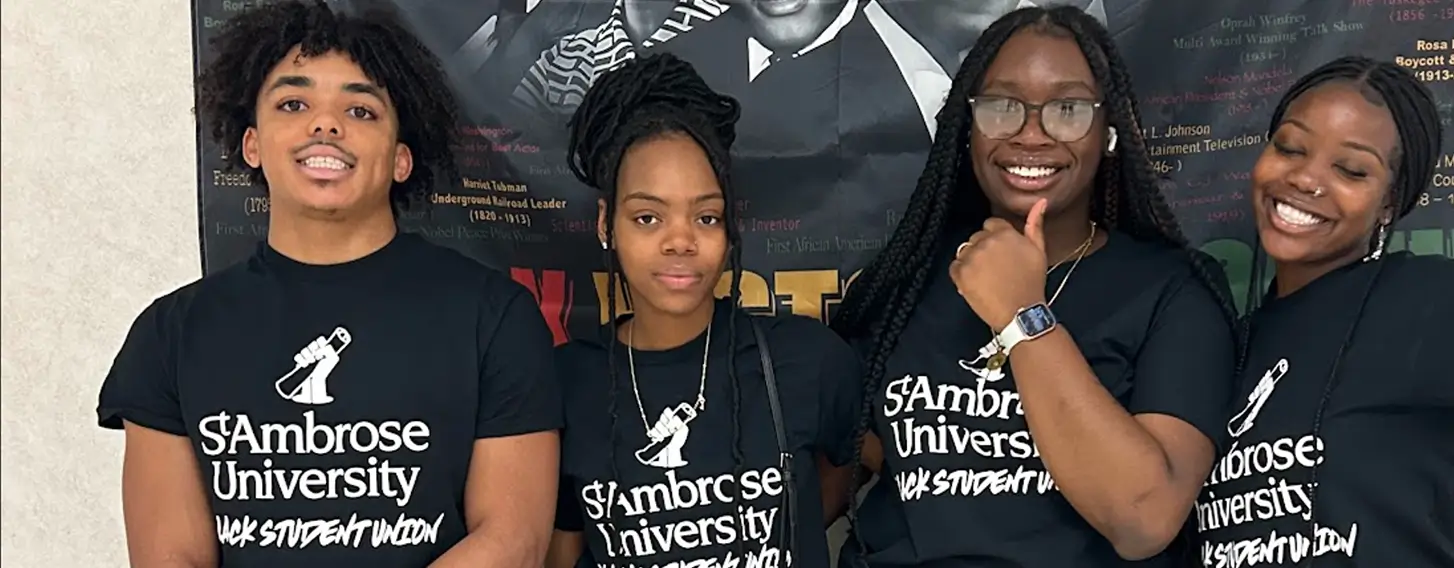 Four members of Black Student Union posing for the camera