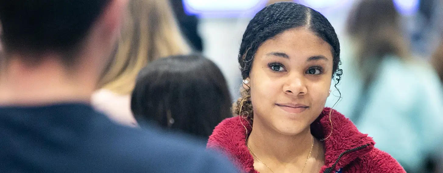 Student looking at someone smiling