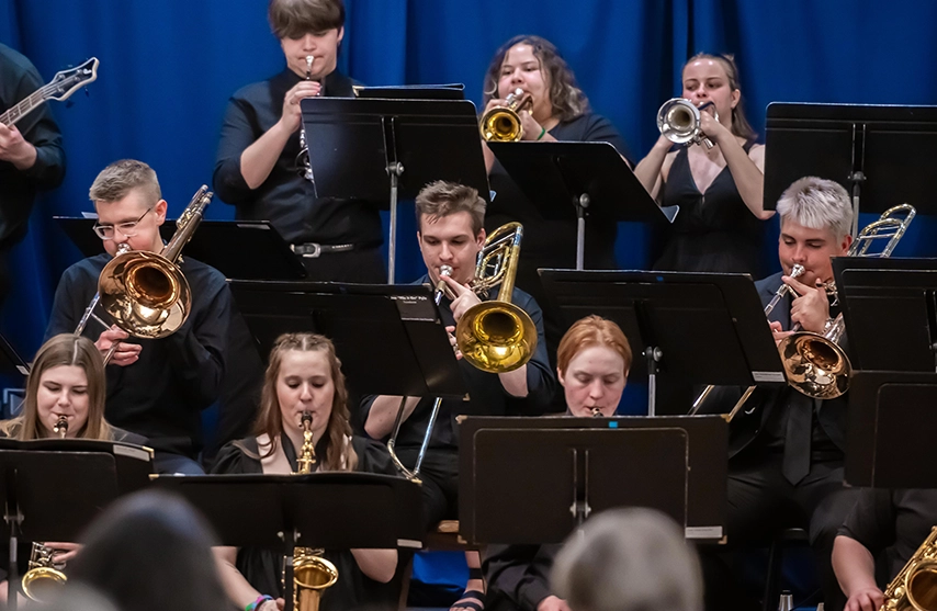 Students play instruments during a live concert at St. Ambrose University.