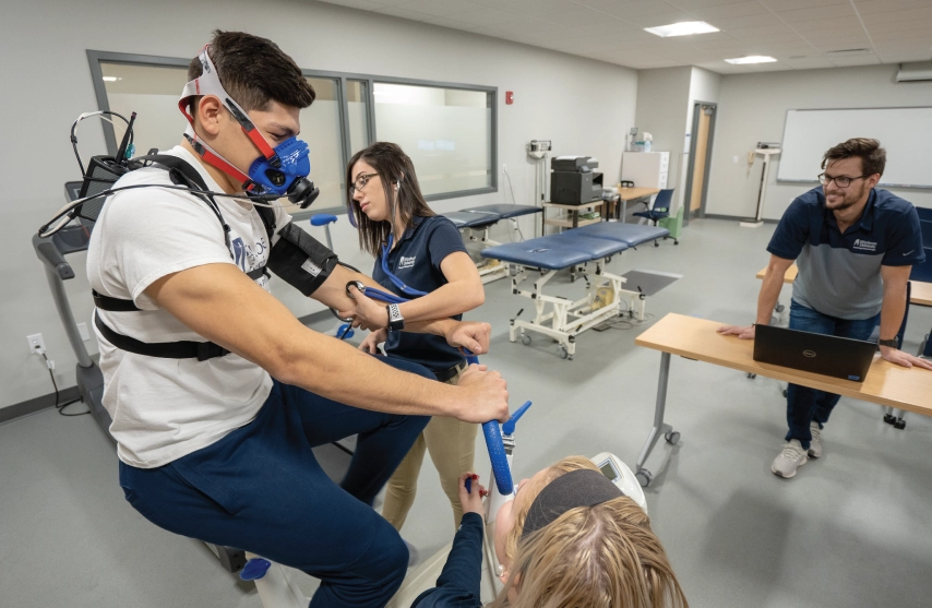 A group of students in an exercise lab.