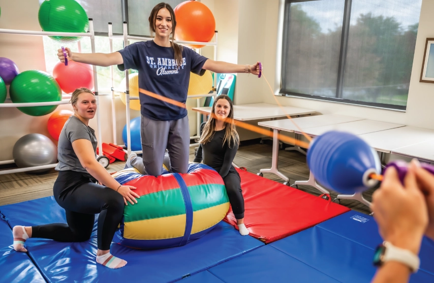 A group of students in an Occupational Therapy lab.