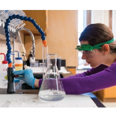 Student in biochemistry lab.