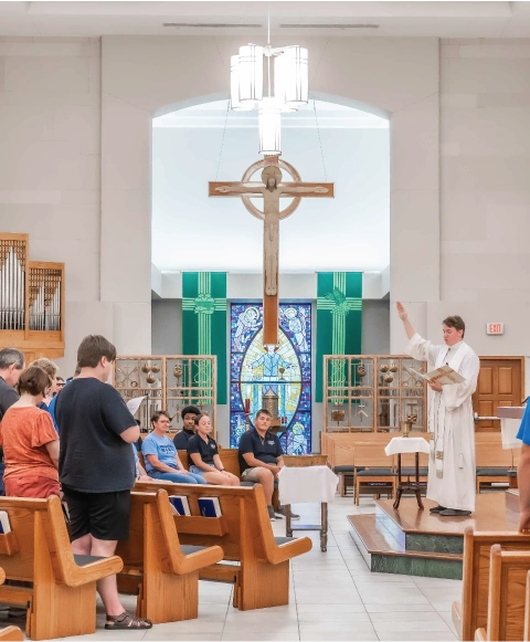 Priest presiding over Catholic Mass.