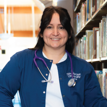Photo of Kathy Franco in library.